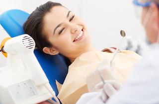 woman smiling during sedation dentistry in nashville tn