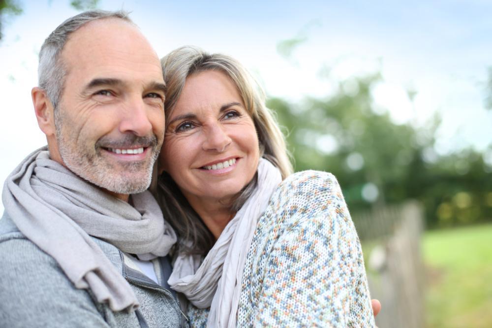 smiling couple with all on 4 implants in nashville tn