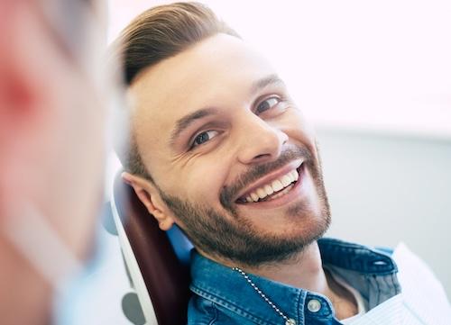 Young man smiling in dental chair, nashville tn