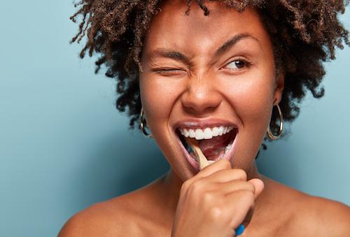 Black woman brushing her teeth, nashville tn