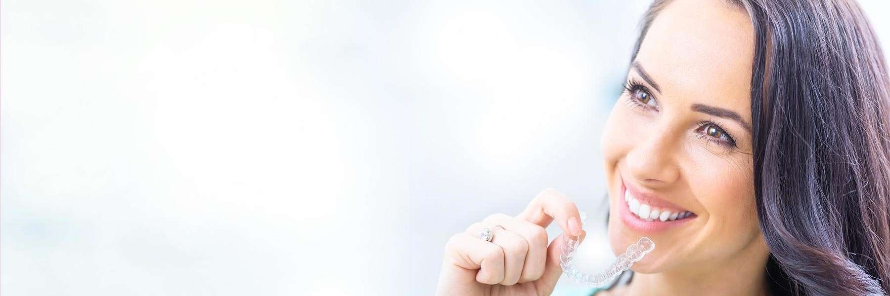 Smiling woman with Invisalign | Clear Braces Brentwood, TN