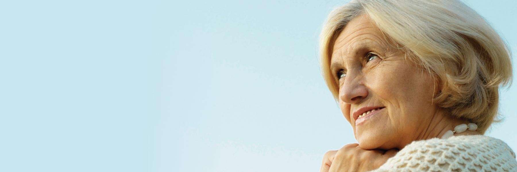 Elderly woman after getting dentures in brentwood tn