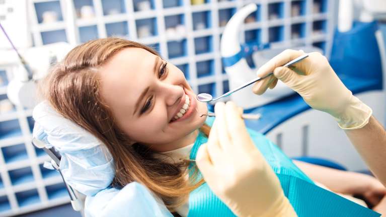 A woman getting a dental exam