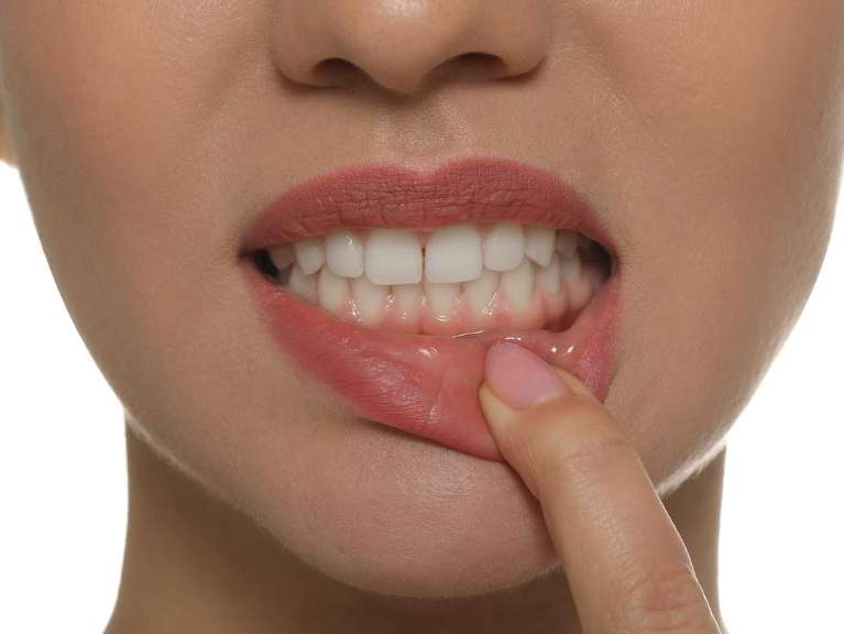 Woman pulling her lip down, nashville tn