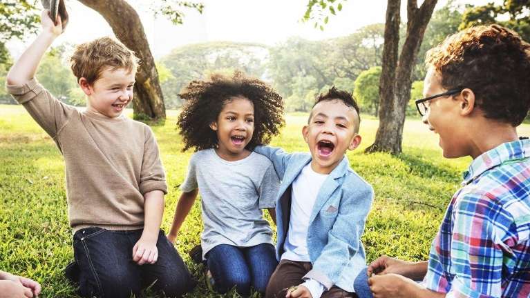 Mixed race of kids smiling at each other, brentwood tn